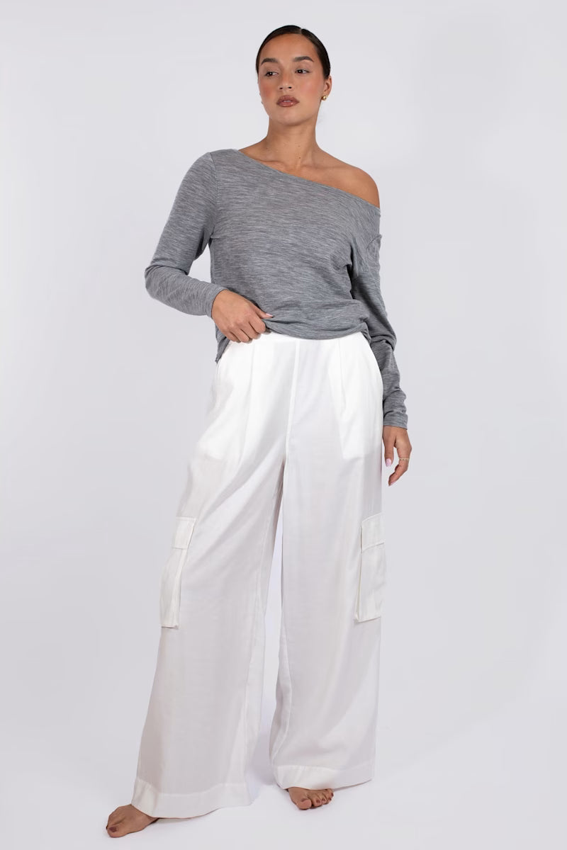 Vaenn Baby Wool Long Sleeve Wide Neck Crew in marble, worn off one shoulder with white cargo pants