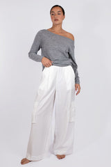 Vaenn Baby Wool Long Sleeve Wide Neck Crew in marble, worn off one shoulder with white cargo pants