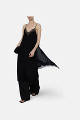 Black Balma slip in movement, lace-edged side panel lifting