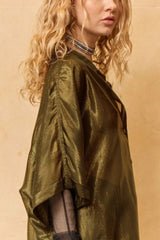 Side view of the Light shirt, sleeve turned back above the elbow