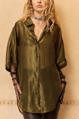 Light lurex shirt in khaki bronze worn open over sheer sleeves, front view