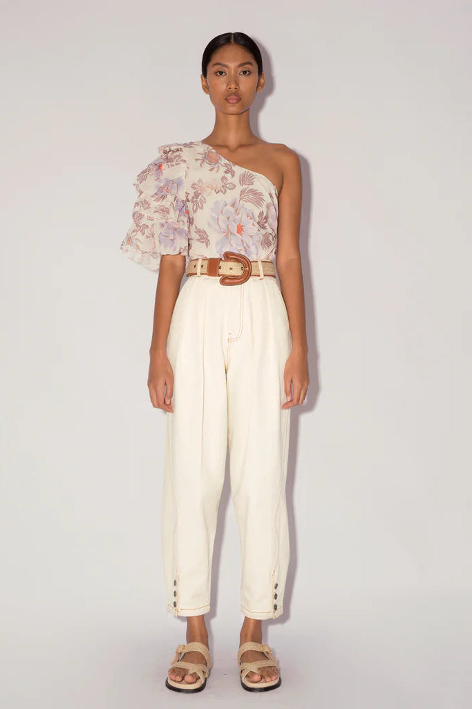 Magali Pascal Desa Top in jasmine light floral, one shoulder ruffle, worn by model, front view