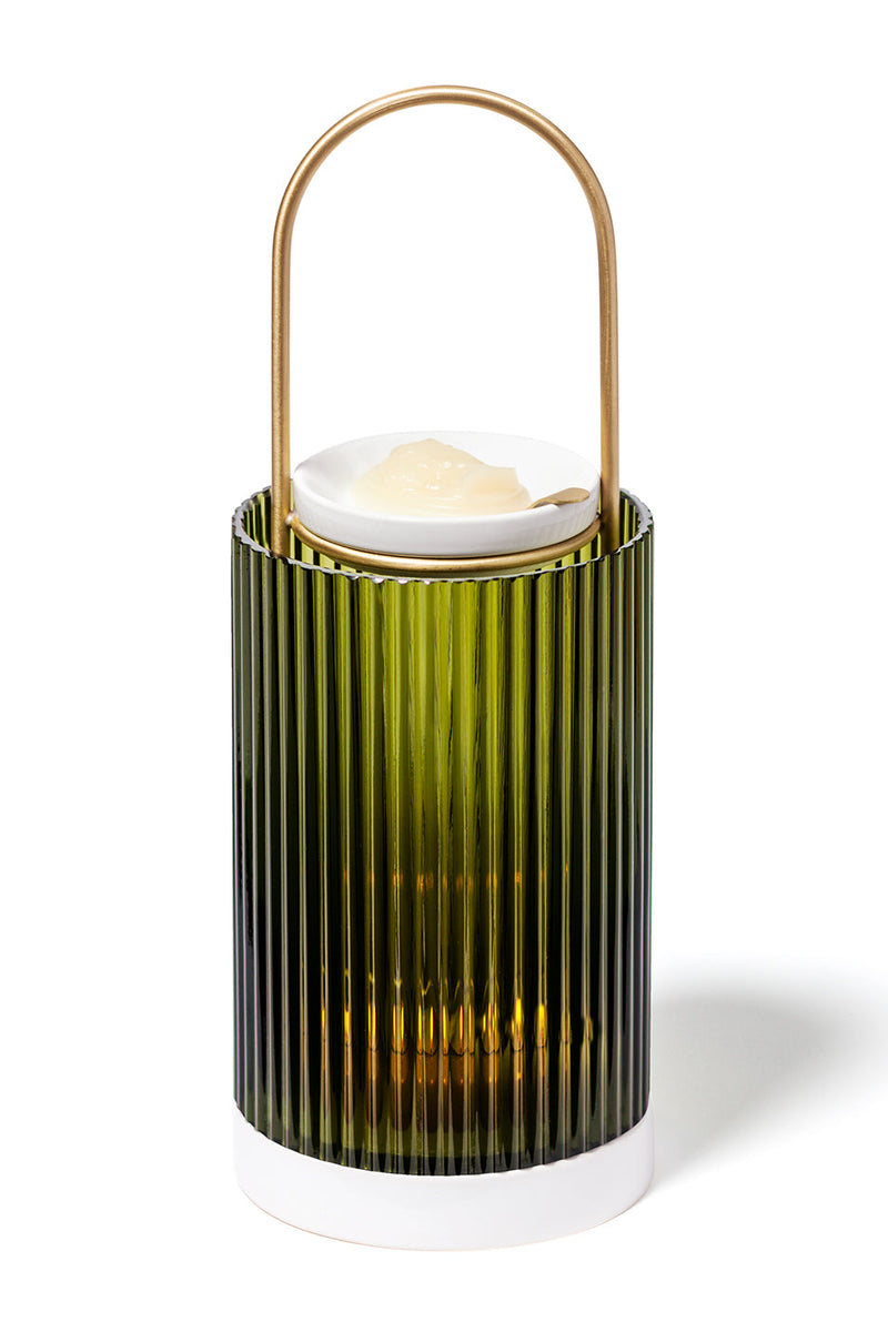 Trudon La Promeneuse Coffret, ribbed green glass lantern with gold-tone handle and white dish, front view